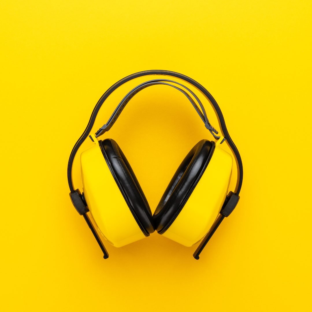 Angélique Olivia wearing noise-cancelling headphones