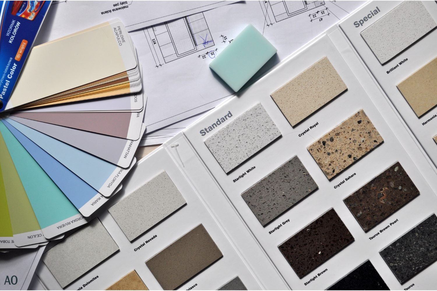 Colour palette and material samples for a home interior, laid out on architectural plans